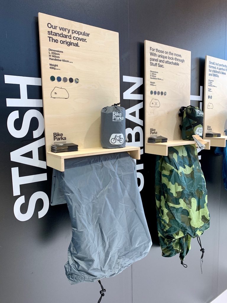The STASH display — cover, Stuff Sac and all five colours.